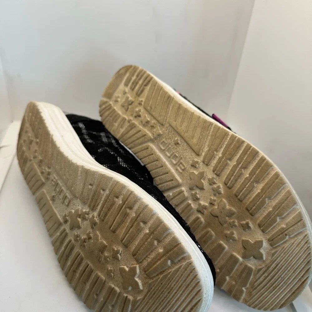 Hey Dude Black and White Sneakers with Slip-On Style